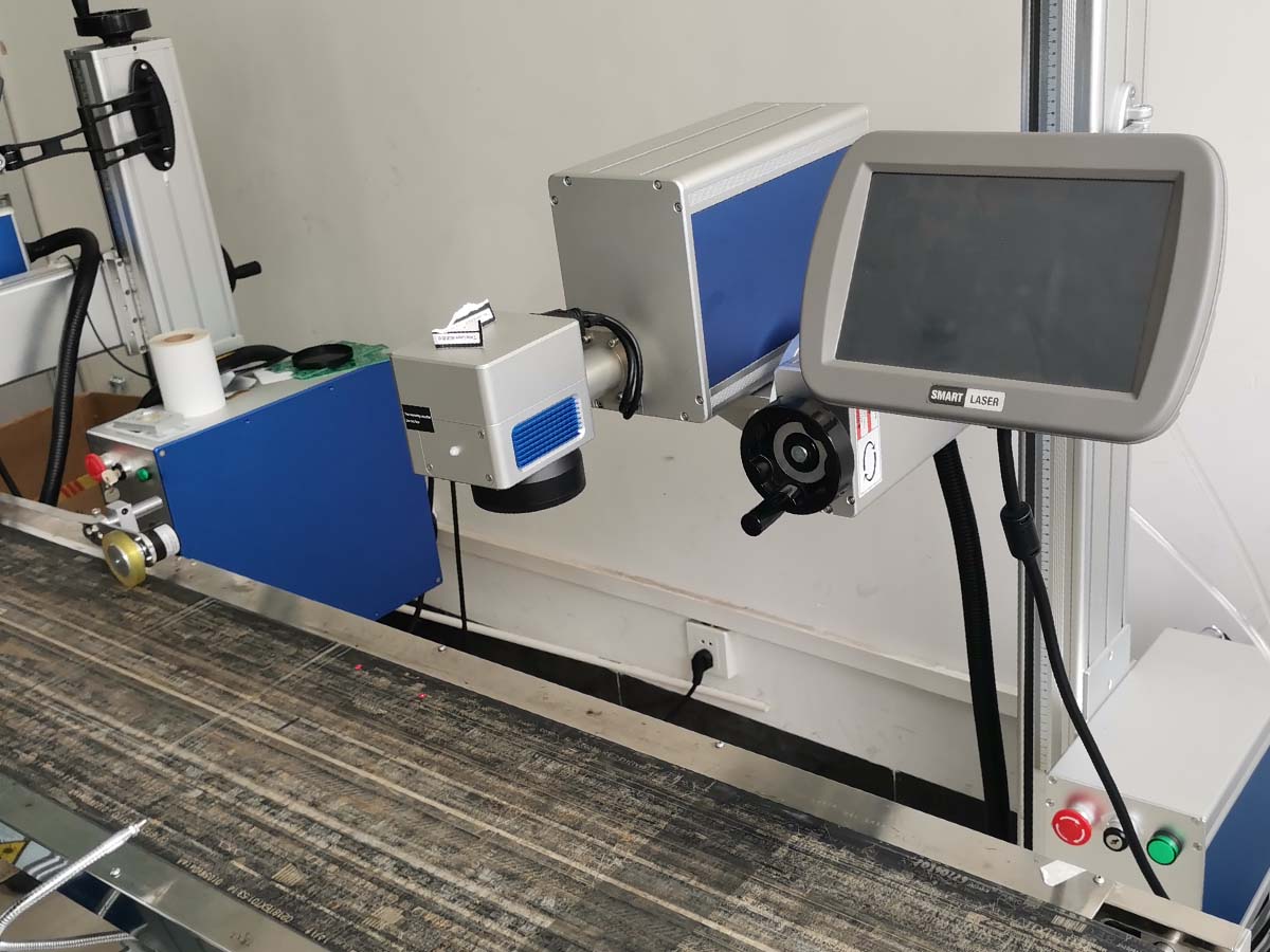 product-1200-900 CO<sub>2</sub> fly marking machine